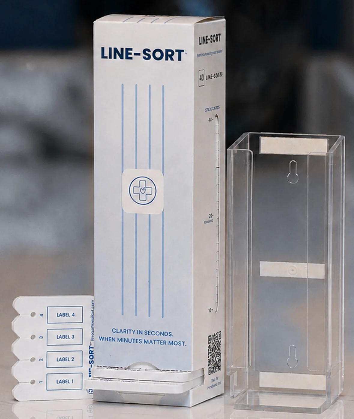 Line-Sort dispenser carton and pad beside the reusable polycarbonate holder